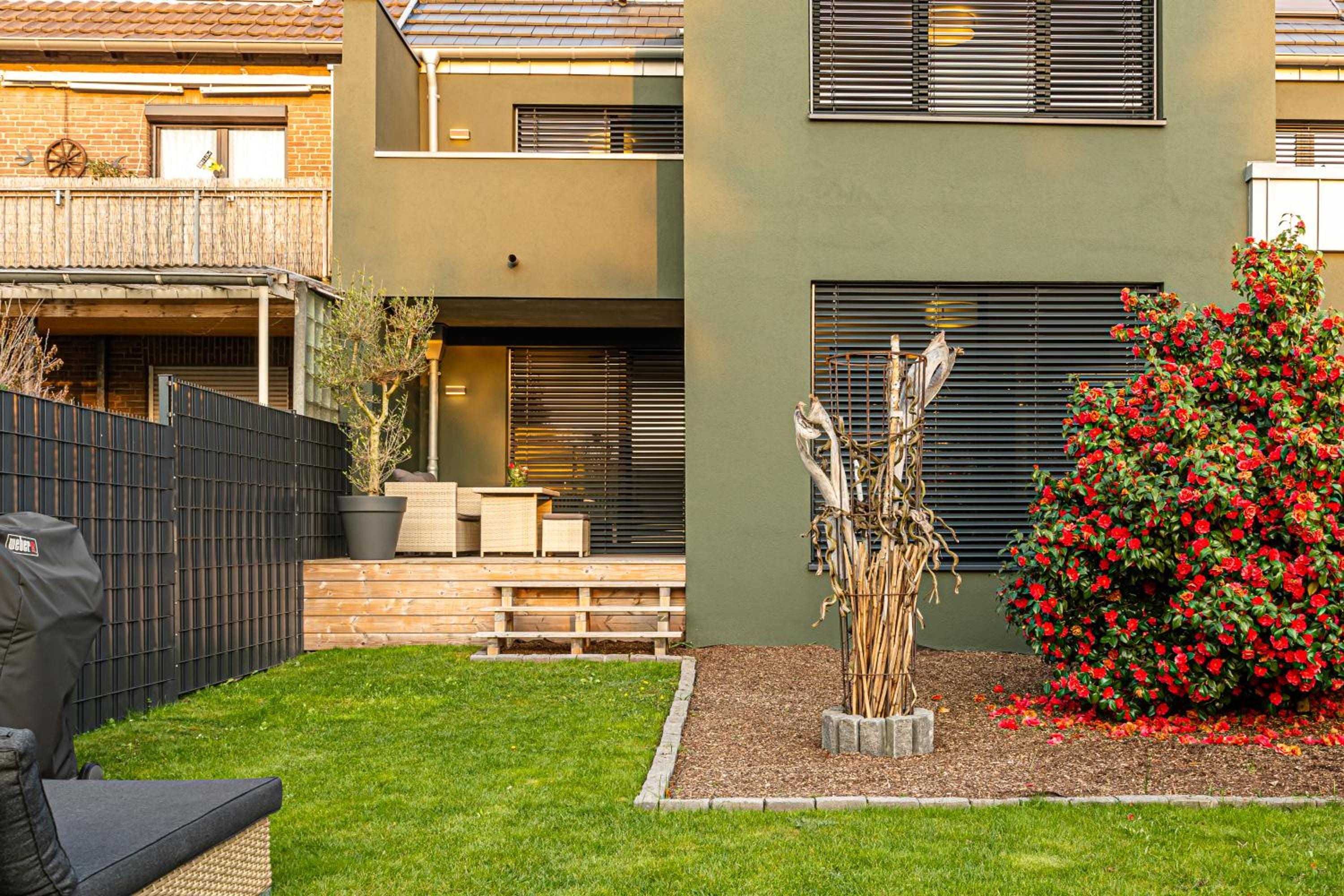 Garten des B26 Apartment Hauses